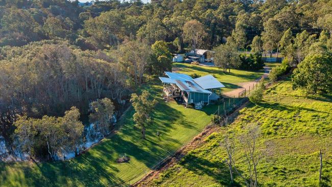 This riverfront property at 411 Beenleigh Redland Bay Rd, Carbrook, sold for $900,000 earlier this year. John McGrath has picked Carbrook has one of his top suburbs to invest in property in 2022.