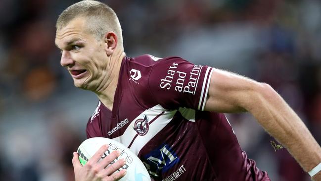 BRISBANE, AUSTRALIA - JULY 24: Tom Trbojevic of the Sea Eagles runs in for a try during the round 19 NRL match between the Manly Sea Eagles and the Wests Tigers at Suncorp Stadium, on July 24, 2021, in Brisbane, Australia. (Photo by Jono Searle/Getty Images)