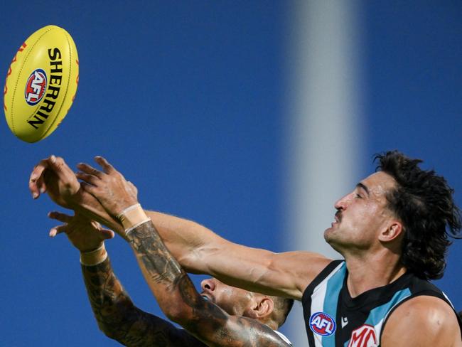 Ivan Soldo of the Power flies for a mark during the 2024 AFL Community Series match in Adelaide. Picture: Mark Brake/Getty Images.