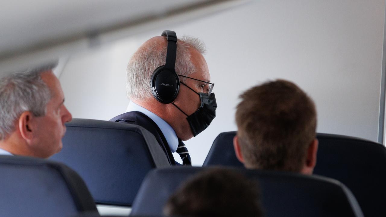 Prime Minister Scott Morrison on the plane. Picture: Jason Edwards