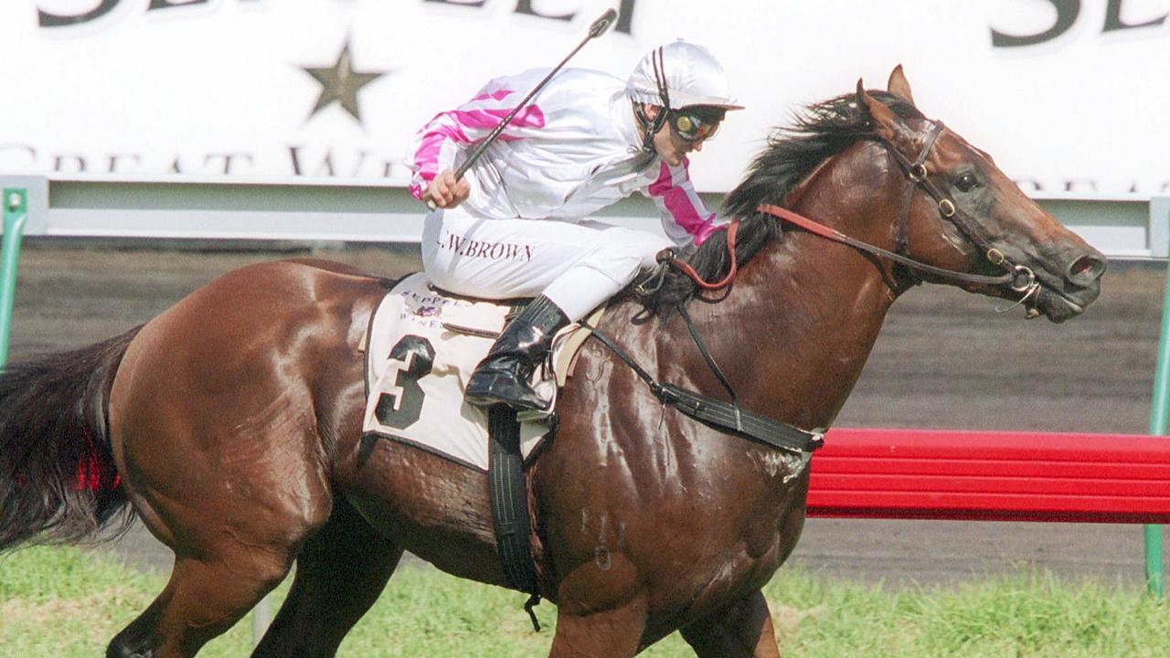 06/03/2004 SPORT: Corey Brown on Exceed and Excel speeds home to win the Newmarket at Flemington. Pic. Craig Hughes