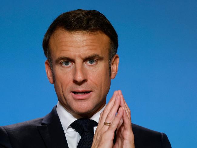 (FILES) France's President Emmanuel Macron addresses media during a press conference on the second and last day of a European Union summit, at the EU headquarters in Brussels, on October 27, 2023. French President Emmanuel Macron said on June 3, 2024 that there was "no question" of "governing" with La France insoumise (LFI, radical left) after the legislative elections, despite the presidential camp's withdrawals in favor of the left-wing Nouveau Front populaire coalition to block the far right. (Photo by Ludovic MARIN / AFP)