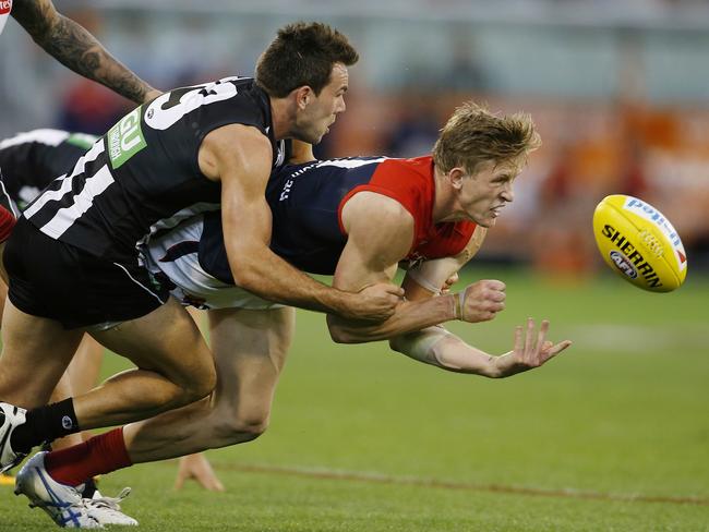 Sam Frost clears by hand. Picture: Michael Klein