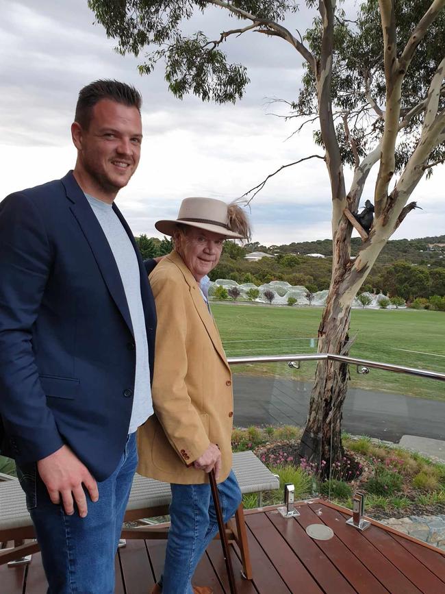 Ben and Peter Teakle overlooking the vineyard from the Line & Label restaurant.