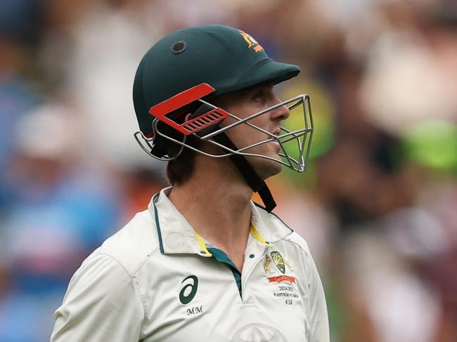 MELBOURNE, AUSTRALIA - DECEMBER 26: Mitchell Marsh of Australia leaves the field after being dismissed by Jasprit Bumrah of India during day one of the Men's Fourth Test Match in the series between Australia and India at Melbourne Cricket Ground on December 26, 2024 in Melbourne, Australia. (Photo by Robert Cianflone/Getty Images)