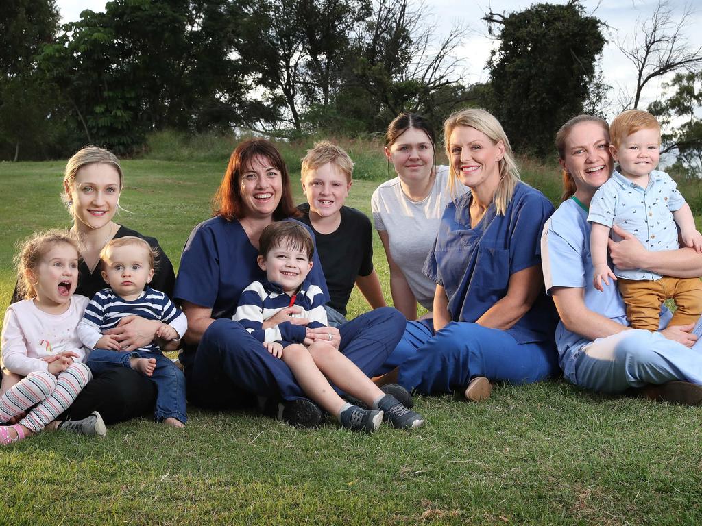 Female orthopaedic surgeons with their children (from left) Zhenya Welyczko with Aurelia, 3, and Alexander, 11 months; Catherine McDougall with Dudley, 4; Sarah Watts with Angus, 13, and Olivia, 16; and Paula Jeffries with Harry Hill, 1. Picture: Liam Kidston