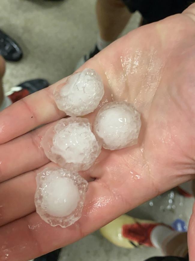 Raiders players were forced to run for cover after a hail storm hit during a training session