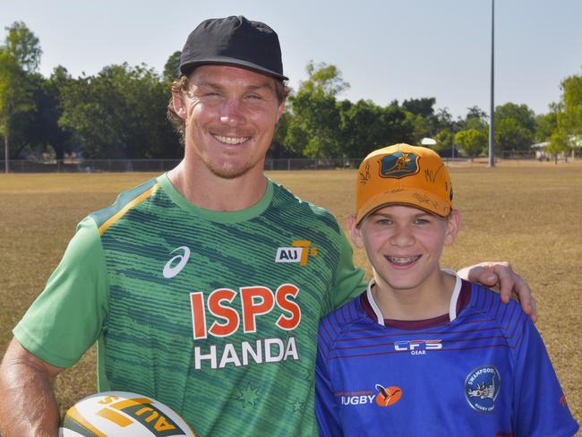 Former Wallabies captain turned 7s player Michael Hooper with NT rugby junior Clancy Nason. Picture: Darcy Jennings.