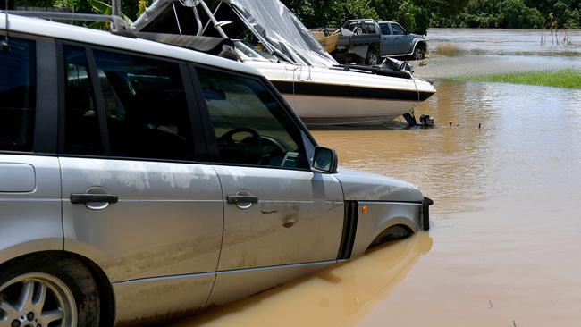 Wednesday February 13. Heavy rain causes flooding in North Queensland. Clean up after flooding in Ingham. Backyard of home in Cordelia next to Herbert River. Picture: Evan Morgan