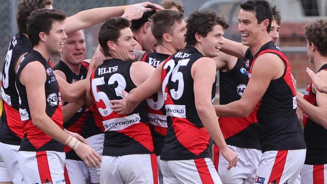 West Adelaide players celebrate a Riley Corbett final quarter goal that sealed the win against Port Adelaide at Richmond Oval on Saturday. Picture: SANFL / David Mariuz