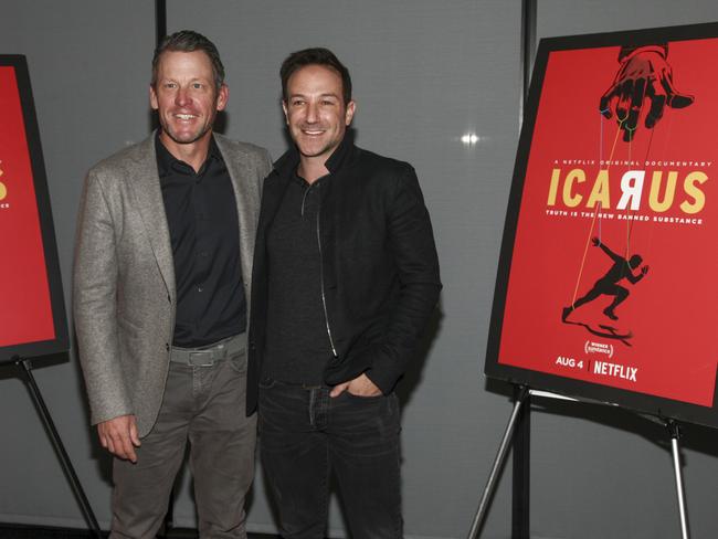 Lance Armstrong, left, and Bryan Fogel, attend a special screening of Netflix's documentary Icarus, which explores doping in cycling. Picture: Andy Kropa/Invision/AP