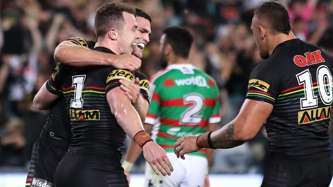 Dylan Edwards celebrates after scoring a try against the Rabbitohs. Picture: Getty Images