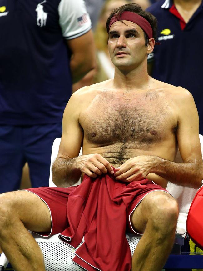 There was no code violation for a shirtless Roger Federer at the 2018 US Open. Picture: Alex Pantling/Getty Images/AFP