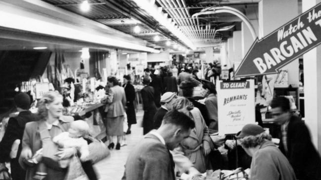 Shoppers hunting for goodies in The Bargain Basement at the Myer Emporium in 1952.