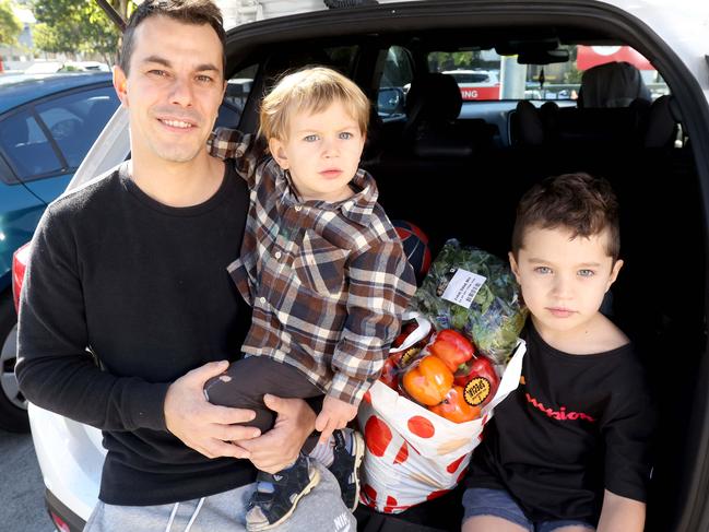 Valentino Rosisvalle with his kids Diego 2yrs, and Eduardo 6yrs, Cost of Living and the increasing prices when doing the grocery shopping, on Friday 8th July 2022 - Photo Steve Pohlner