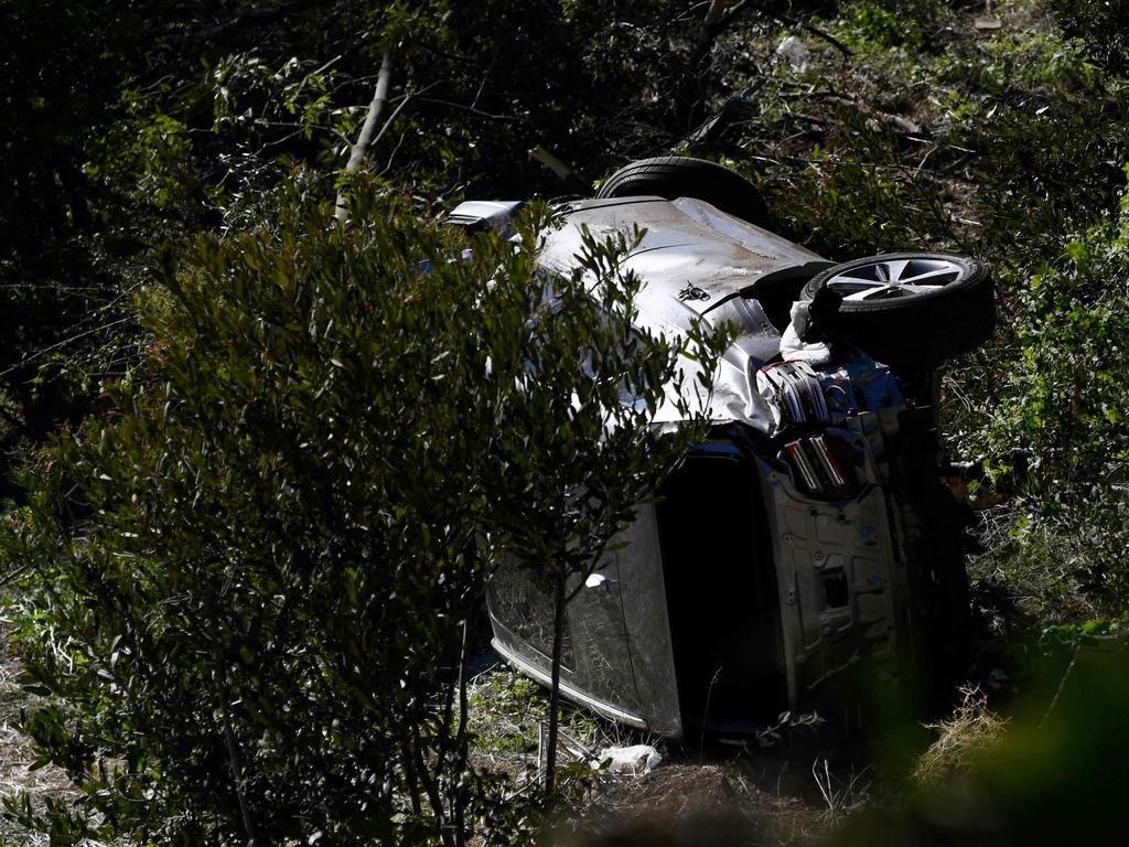 The vehicle driven by golfer Tiger Woods lies on its side in Rancho Palos Verdes, California, after a rollover accident. Picture: AFP