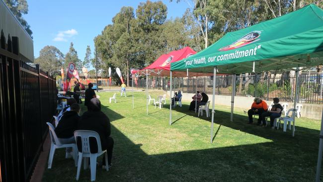 An outdoor vaccination clinic is set up at Tharawal Aboriginal Medical Service, in Airds, on Thursday after the clinic was given 240 Pfizer vaccines. Picture: Lauren Ferri