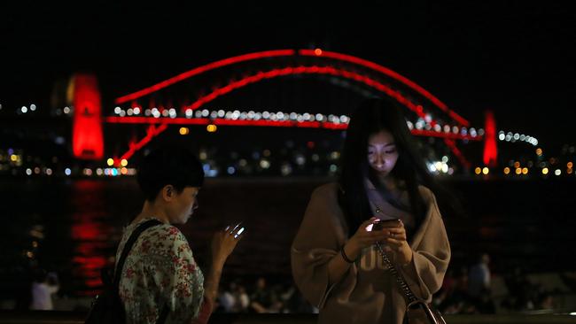 The Sydney Harbour Bridge was also lit up. Picture: AAP Image/Steven Saphore