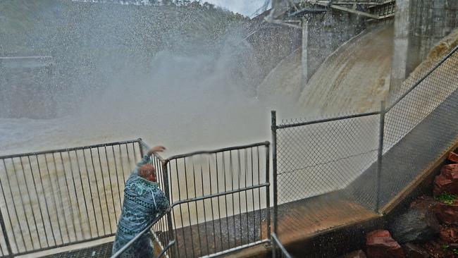 Ross River Dam as it releases water due to flooding rain. Picture: Zak Simmonds