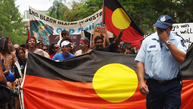 Aboriginal protesters participate in Australia Day protests.