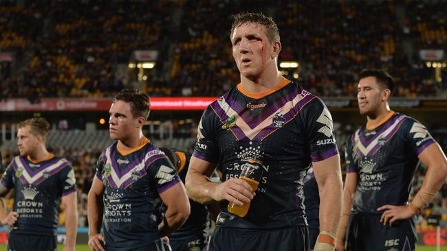 AUCKLAND, NEW ZEALAND — APRIL 07: Ryan Hoffman of the Storm (C) and his team mates look dejected after their loss in the round five NRL match between the Wests Tigers and the Melbourne Storm at Mt Smart Stadium on April 7, 2018 in Auckland, New Zealand. (Photo by Kai Schwoerer/Getty Images)