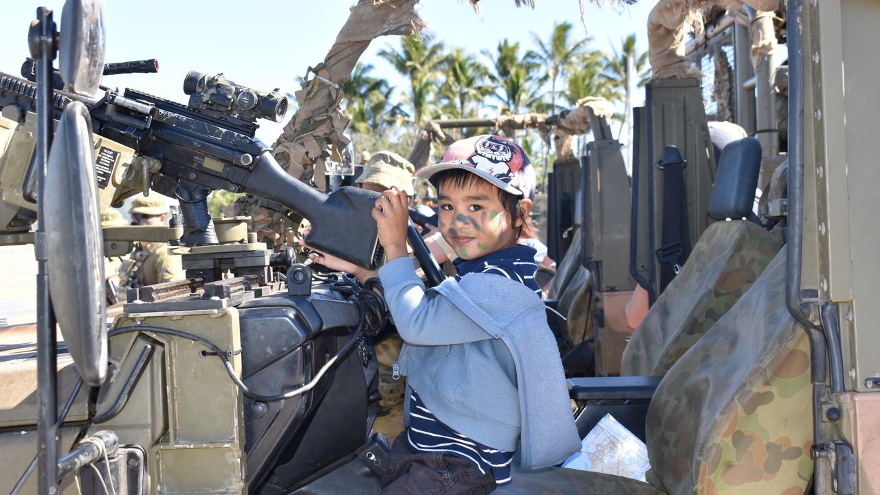 Four-year-old Nathaniel Empleo of Bowen in the front seat of a surveillance reconnaissance vehicle at the Exercise Talisman Sabre open day. Picture: Kirra Grimes