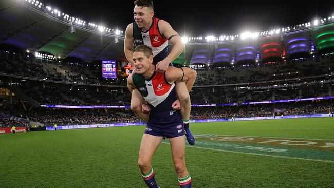 Hayden Ballantyne and Aaron Sandilands farewell Freo fans. Picture: Will Russell (Getty).