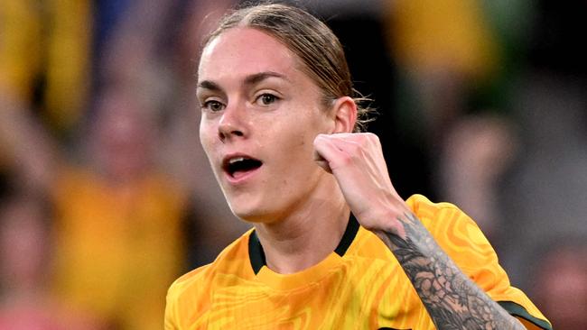 Australia's Sharn Freier celebrates scoring a goal during the women's international football friendly between Australia and Taiwan at the Rectangular Stadium in Melbourne on December 4, 2024. (Photo by William WEST / AFP) / --IMAGE RESTRICTED TO EDITORIAL USE - STRICTLY NO COMMERCIAL USE--