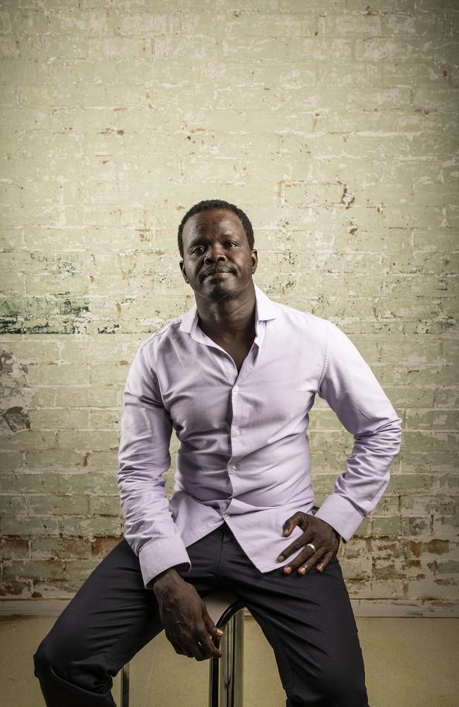 Ayik Chut is a former South Sudanese child soldier who now lives in Brisbane and has written a book about his experiences. Picture: Mark Cranitch