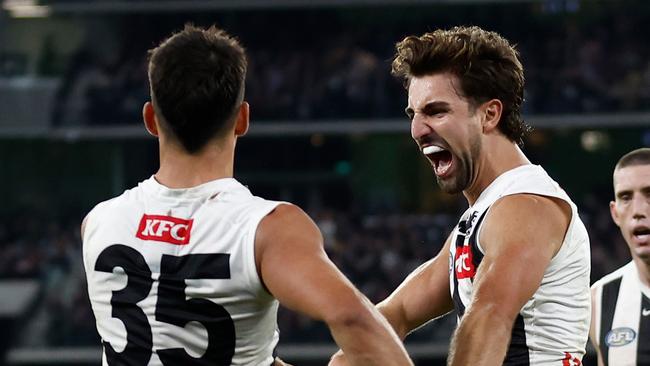 MELBOURNE, AUSTRALIA - MAY 03: Nick Daicos (left) and Josh Daicos of the Magpies celebrate during the 2024 AFL Round 08 match between the Carlton Blues and the Collingwood Magpies at The Melbourne Cricket Ground on May 03, 2024 in Melbourne, Australia. (Photo by Michael Willson/AFL Photos via Getty Images)