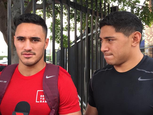 NRL Players Valentine Holmes and Jason Taumalolo (Right) speak to reporters in Los Angeles on Saturday, Nov.26, 2016, after working out for 14 NFL teams. (AAP Image/Mitchell Peter) NO ARCHIVING