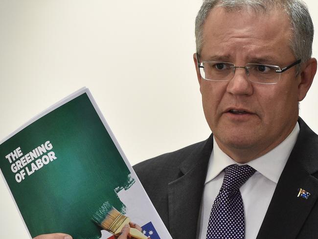 Federal Tresaurer Scott Morrison speaks to the media in Melbourne, Wednesday, June 15, 2016. Morrison was launching a new ad highlighting the possibility of a Greens and Labor minority government. (AAP Image/Julian Smith) NO ARCHIVING