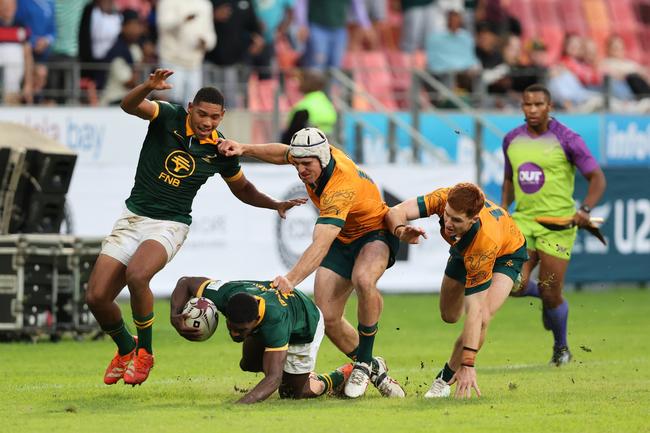 Nick Conway of Australia brings down Cheswill Jooste of South Africa during the U20 Rugby Championship match between South Africa and Australia. Photo by Richard Huggard.