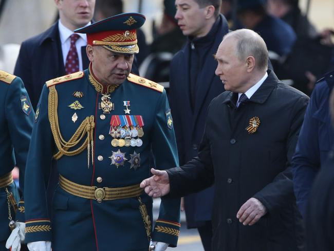 Russian President Vladimir Putin and Defence Minister Sergei Shoigu attend the Victory Day Parade at Red Square on May 9.