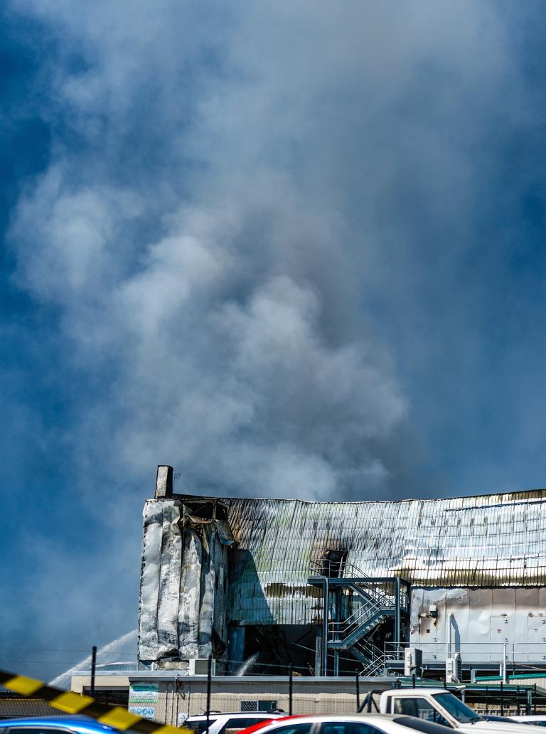 Emergency services continue to work on the huge fire at the Thomas Foods abattoir in Murray Bridge. Picture: AAP / Roy Vandervegt