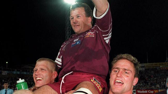 Gary Larson (L) & Billy Moore lift captain Trevor Gillmeister on their shoulders after victory in third 1995 State of Origin match, New South Wales (NSW) v Queensland, at Suncorp Stadium. Sport / Rugby League / With Others