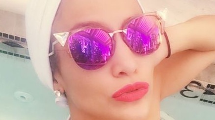 JLo flaunts killer bikini body and abs in a series of selfies.