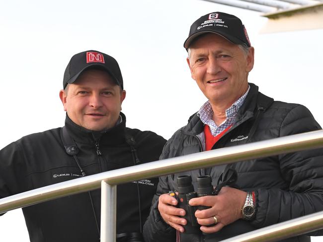 Redzel trainers Peter (right) and Paul Snowden are seen during trackwork at Royal Randwick Racecourse in Sydney, Monday, October 14, 2019. (AAP Image/Simon Bullard) NO ARCHIVING, EDITORIAL USE ONLY