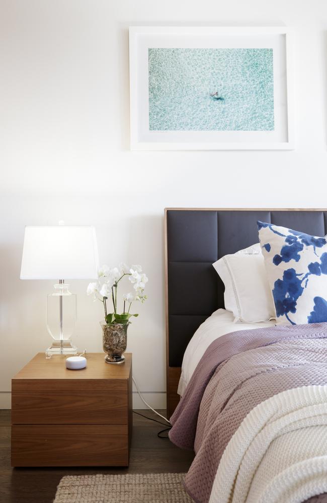 Pillow talk, too? An Amazon Echo is displayed as part of a bedside setting.