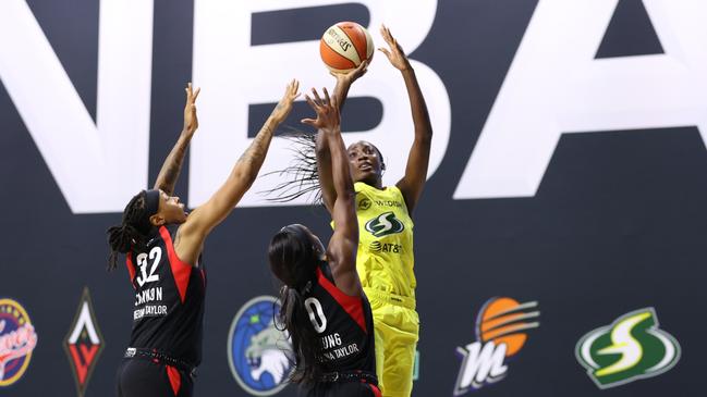 Ezi Magbegor gets a three-point shot off during the finals. Picture: Stephen Gosling/NBAE via Getty