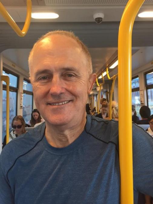 Malcolm Turnbull riding the G:Link light rail on the Gold Coast. Photo: Supplied