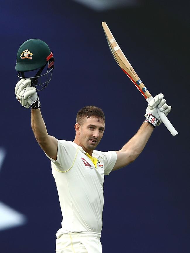 Shaun Marsh celebrates his hundred.