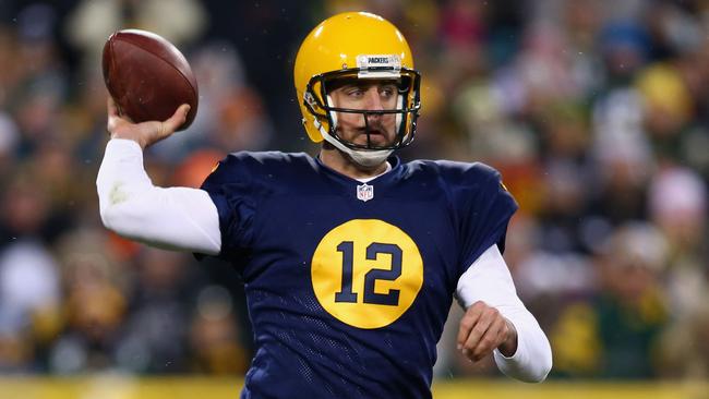 Aaron Rodgers #12 of the Green Bay Packers looks to pass against the Philadelphia Eagles.