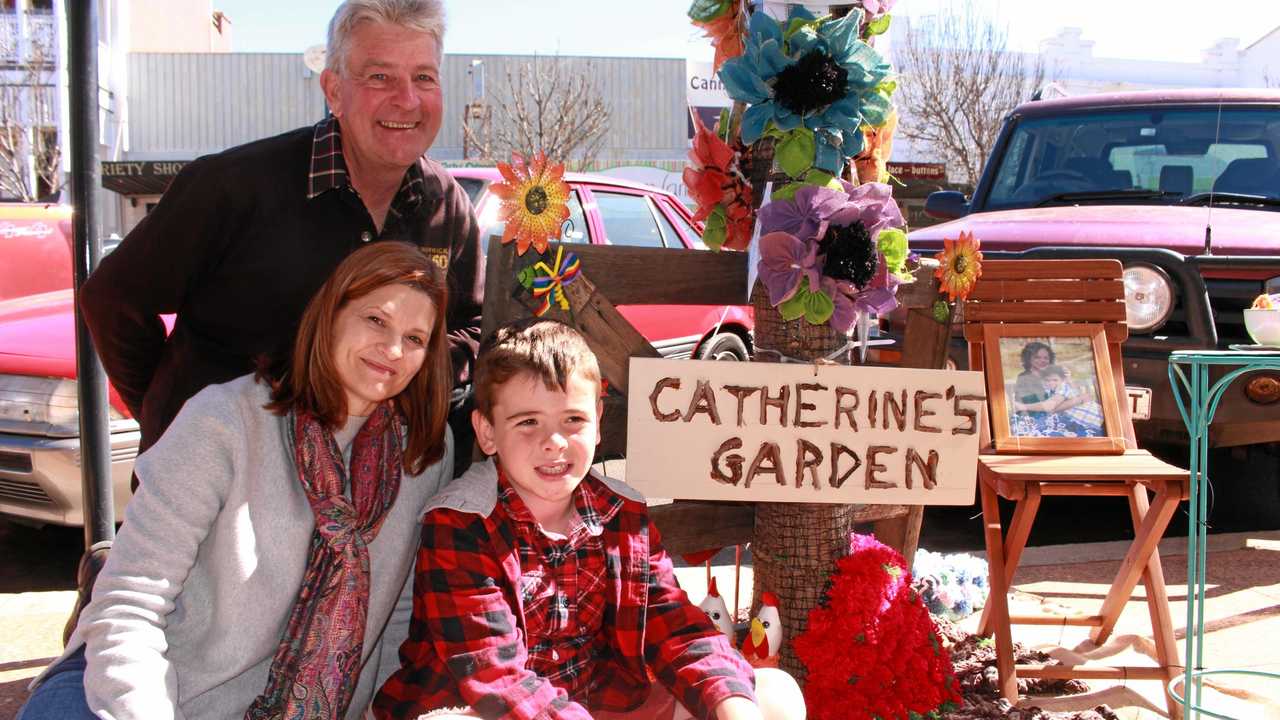 LEAVING A TRACE: Catherine Dunn is remembered by family members Andrew Dunn, Judy Gillespie and Peter Dunn as a woman who loved her garden and her community. Picture: Marian Faa