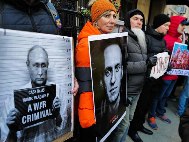 People mourn the death of Russian opposition leader Alexei Navalny during a rally in front of the Russian Consulate in New York City. Picture: AFP