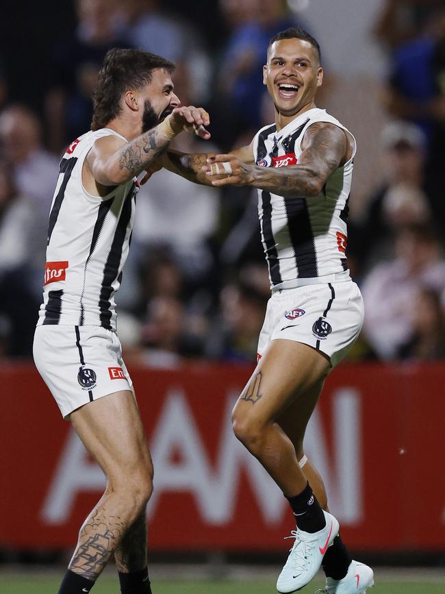 Bobby Hill and Oleg Markov celebrate a goal for Collingwood. Picture: Michael Klein