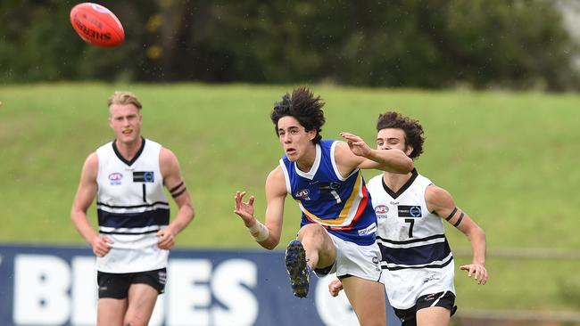 Adam Cerra gets a kick away against Northern Knights. Picture: David Smith