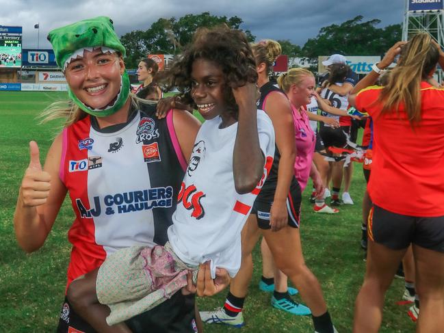 Bella Clarke with young fan Crystal Smith after Southern Districts’ defeat of Waratah in the 2020 Women’s Premier League Grand Final. Picture: Glenn Campbell