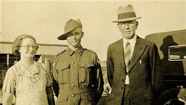 SA WEEKEND . SOLDIER SON: Ed photographed on the farm with his parents, Catherine and Edgar.