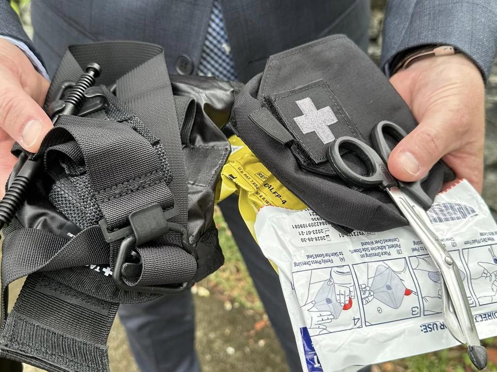 A closer look at the tourniquet and tactical first aid kit.